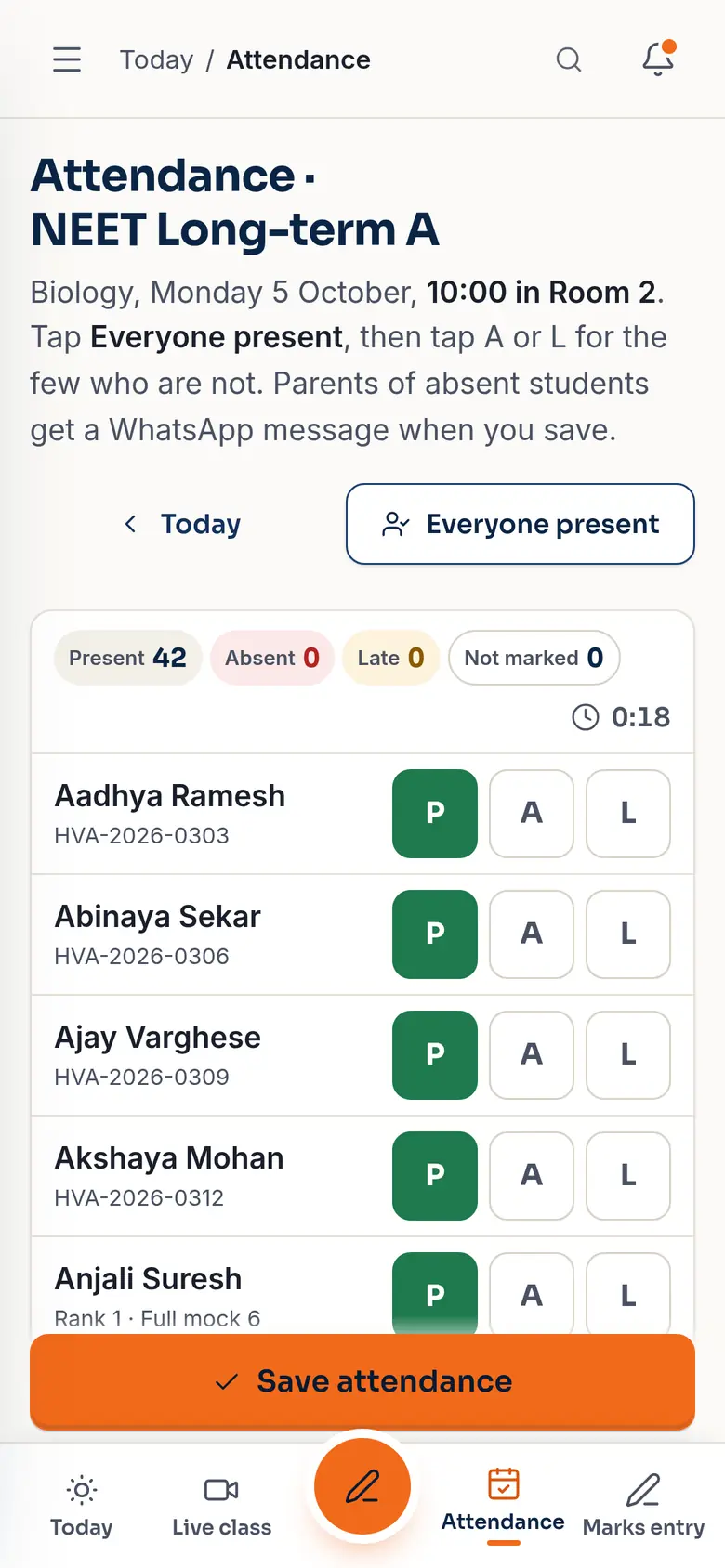 A teacher marking attendance on a phone (sample data).